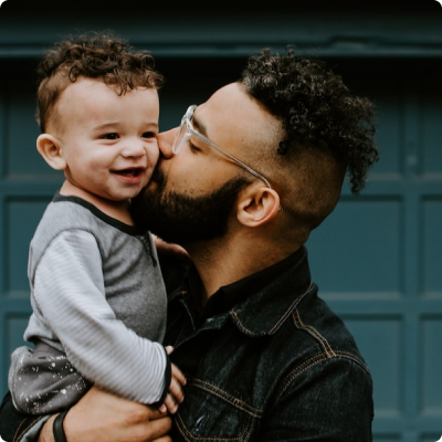 man holding child